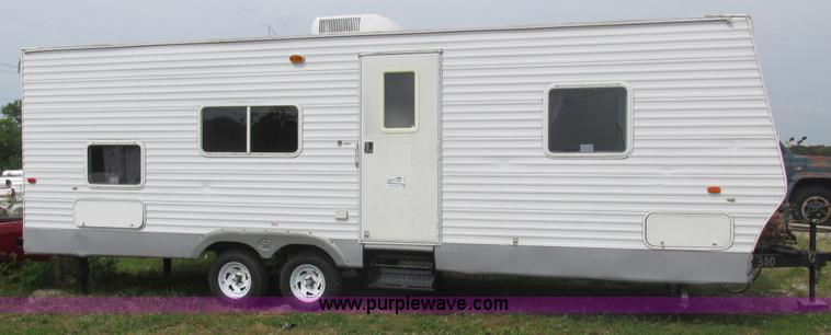 image for item L6198 2005 Sunray Smokey camper