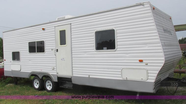 image for item L6198 2005 Sunray Smokey camper