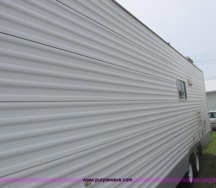 image for item L6198 2005 Sunray Smokey camper