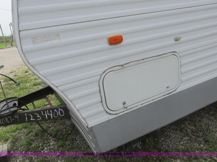 image for item L6198 2005 Sunray Smokey camper