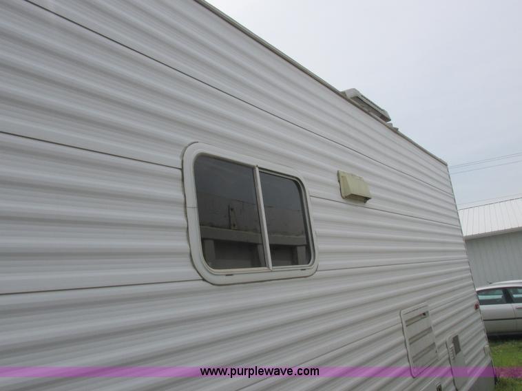 image for item L6198 2005 Sunray Smokey camper