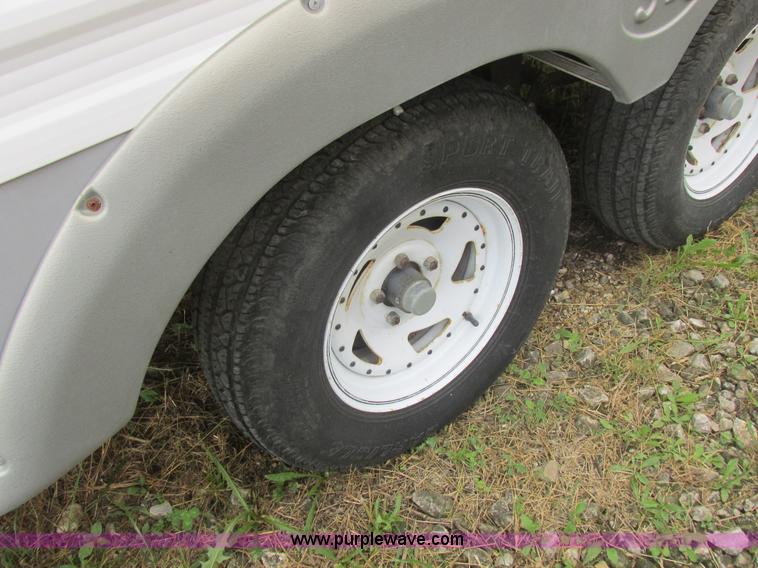 image for item L6198 2005 Sunray Smokey camper