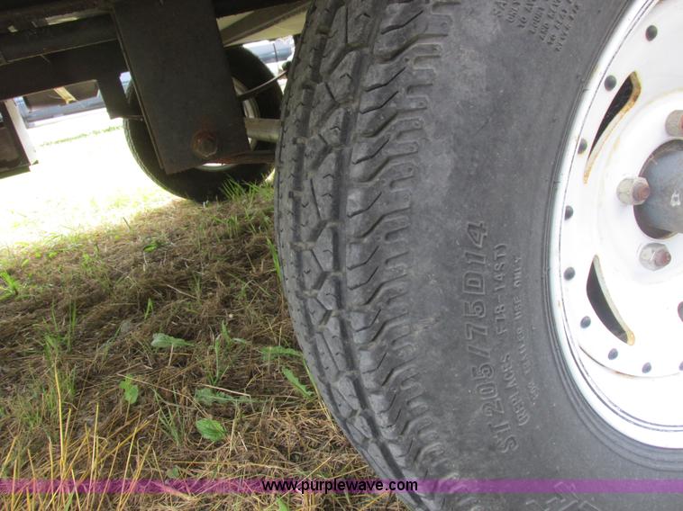 image for item L6198 2005 Sunray Smokey camper