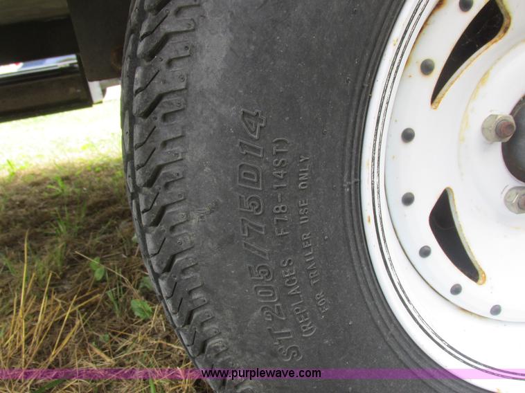 image for item L6198 2005 Sunray Smokey camper