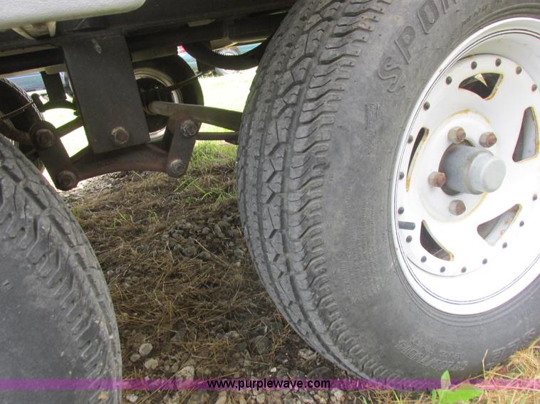 image for item L6198 2005 Sunray Smokey camper