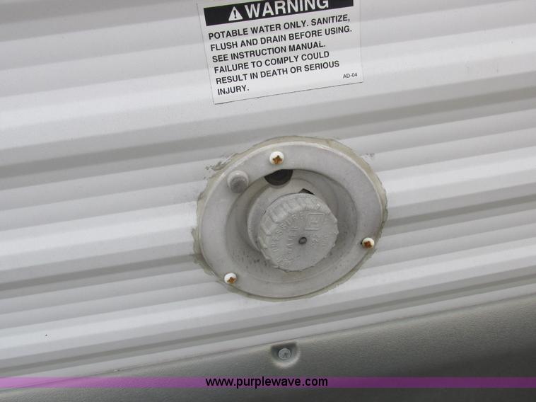 image for item L6198 2005 Sunray Smokey camper