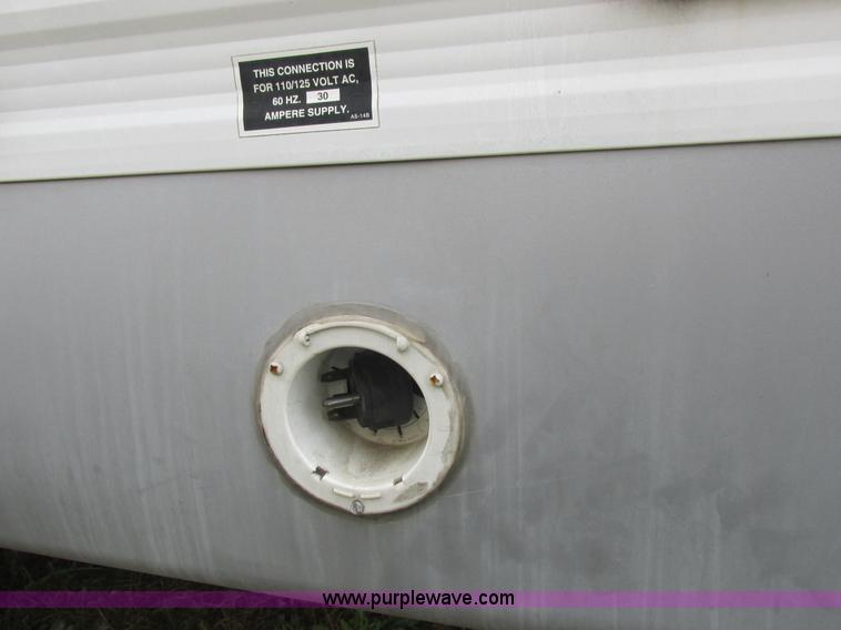 image for item L6198 2005 Sunray Smokey camper