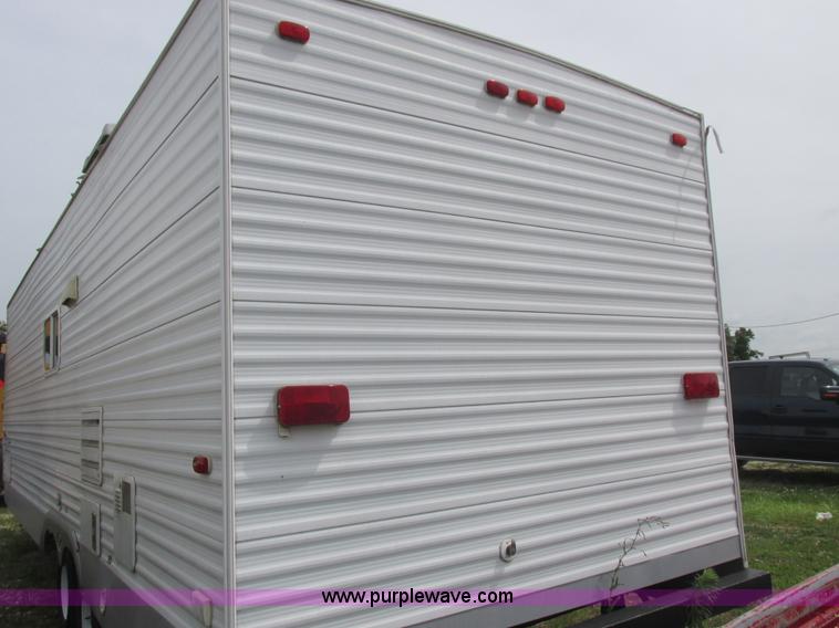 image for item L6198 2005 Sunray Smokey camper