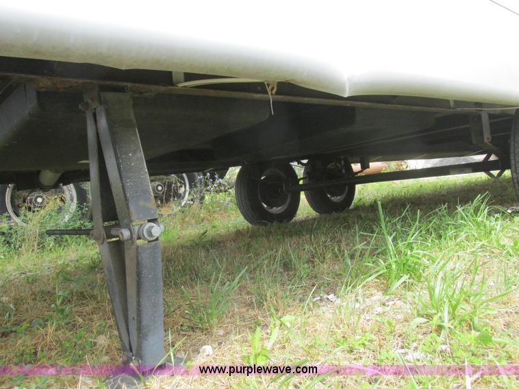 image for item L6198 2005 Sunray Smokey camper