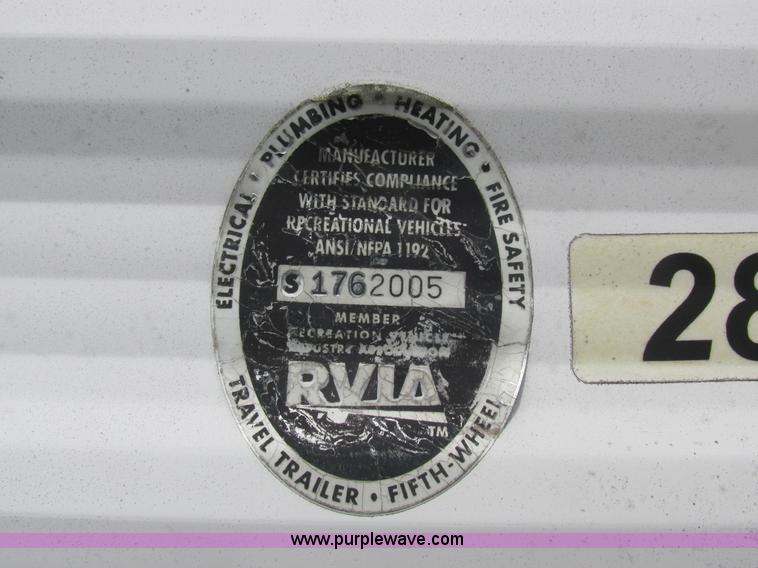 image for item L6198 2005 Sunray Smokey camper