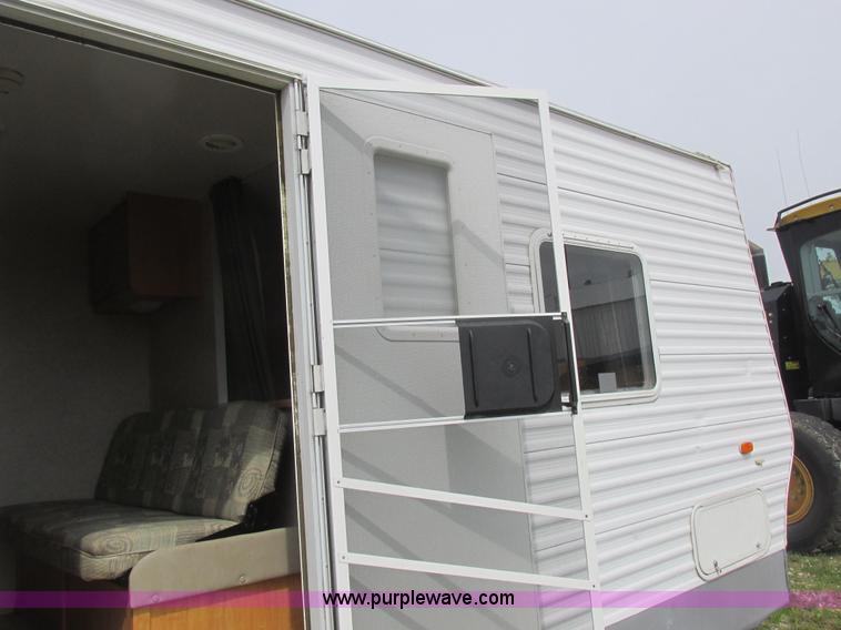 image for item L6198 2005 Sunray Smokey camper