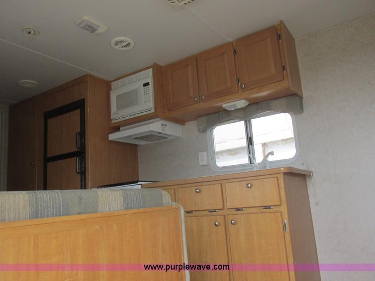 image for item L6198 2005 Sunray Smokey camper