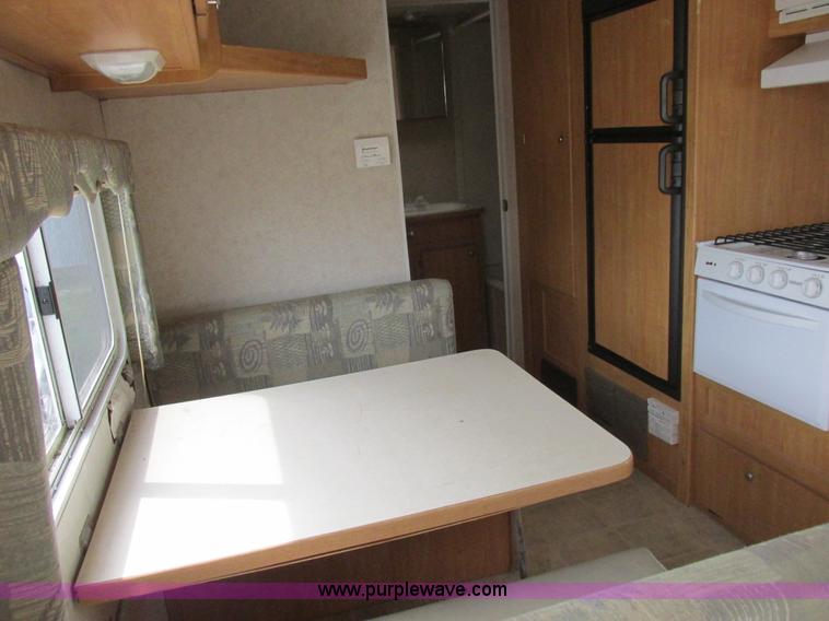 image for item L6198 2005 Sunray Smokey camper