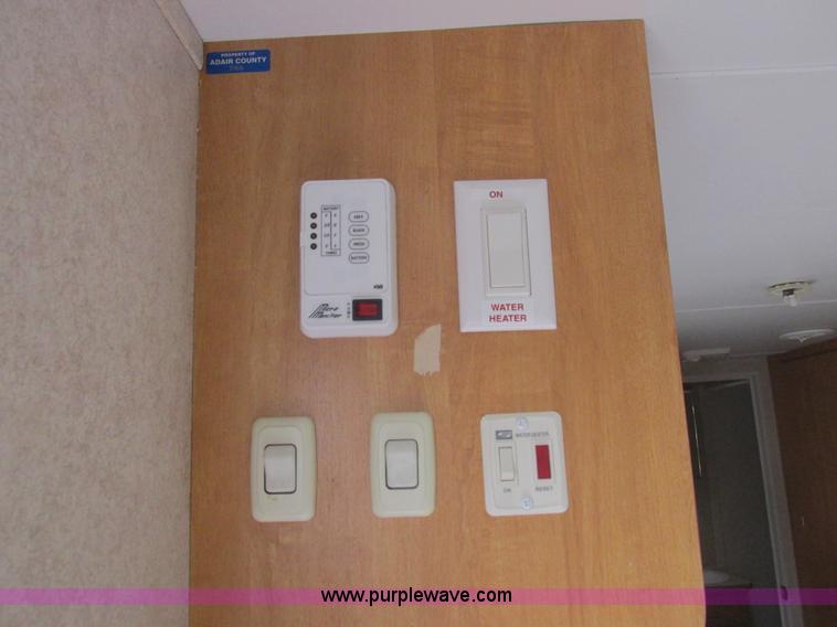 image for item L6198 2005 Sunray Smokey camper