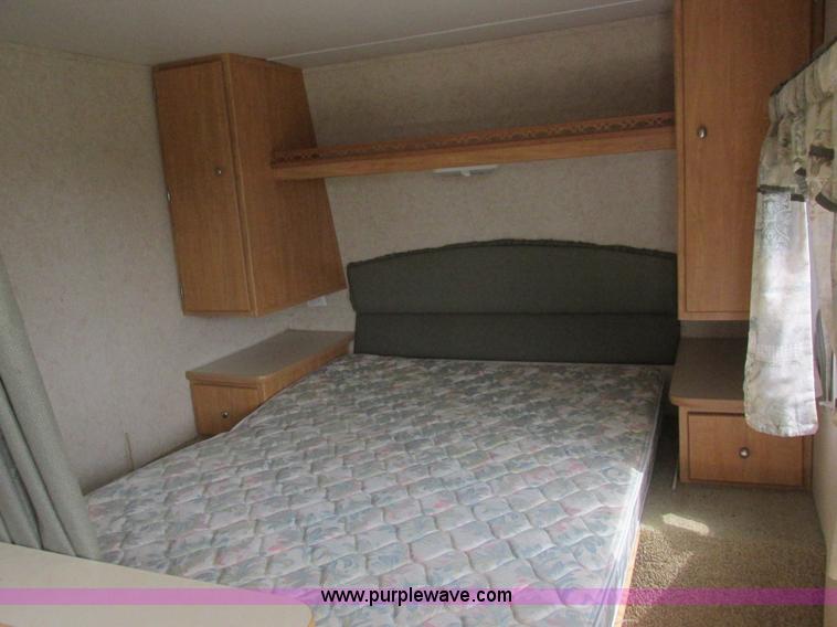 image for item L6198 2005 Sunray Smokey camper