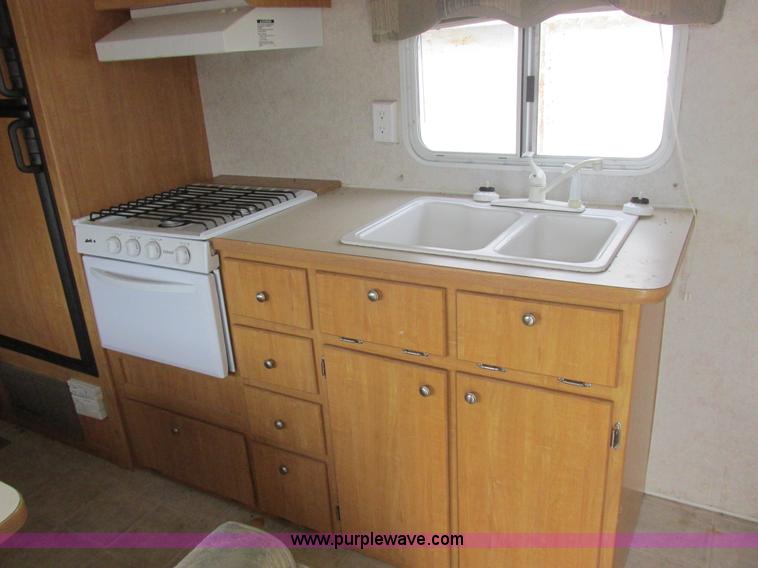 image for item L6198 2005 Sunray Smokey camper