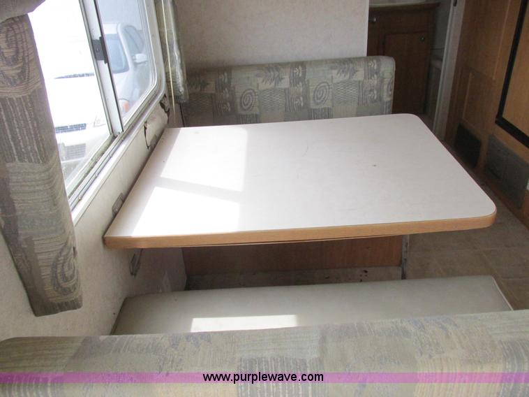 image for item L6198 2005 Sunray Smokey camper