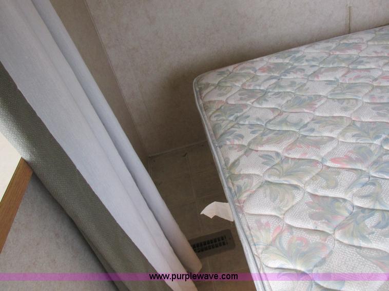 image for item L6198 2005 Sunray Smokey camper