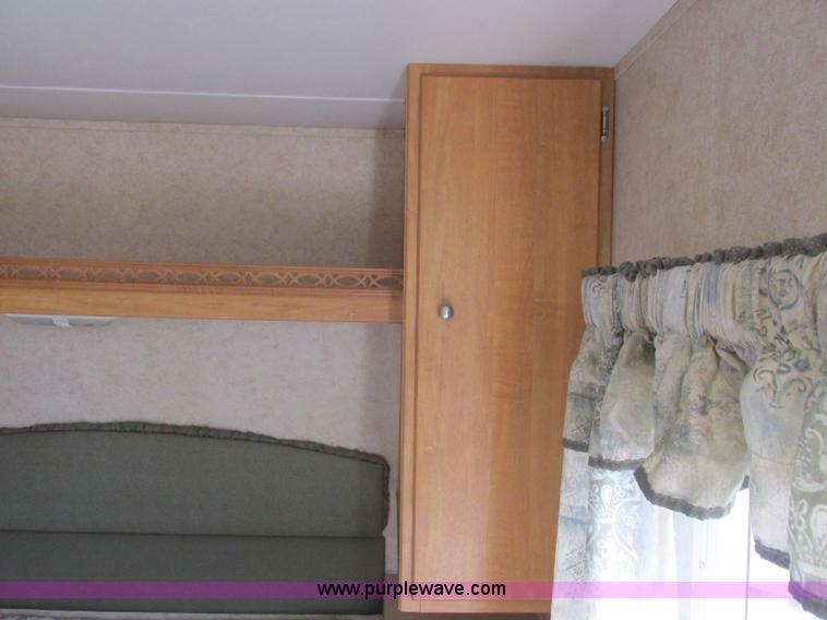 image for item L6198 2005 Sunray Smokey camper