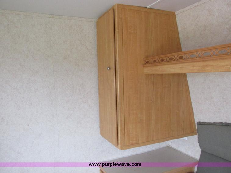 image for item L6198 2005 Sunray Smokey camper