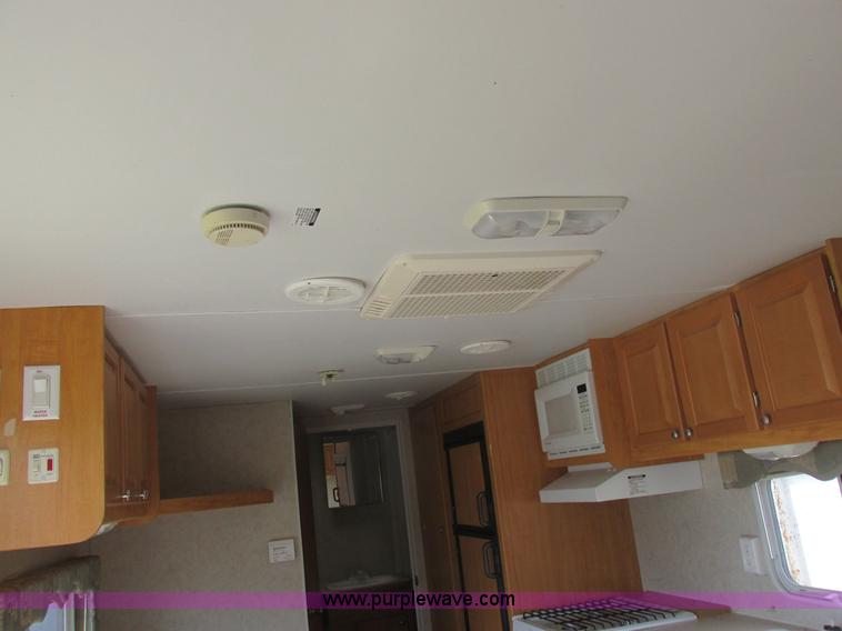 image for item L6198 2005 Sunray Smokey camper