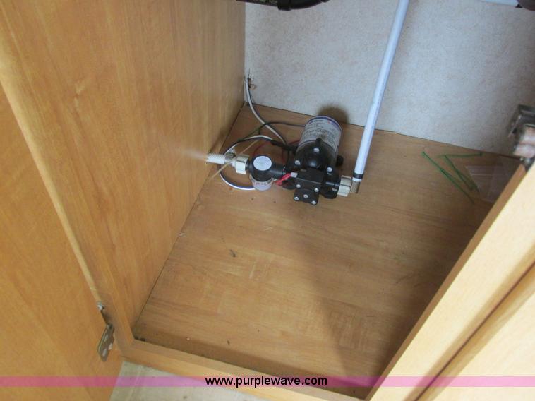 image for item L6198 2005 Sunray Smokey camper