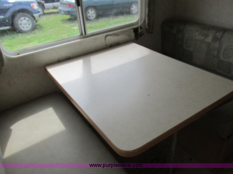 image for item L6198 2005 Sunray Smokey camper