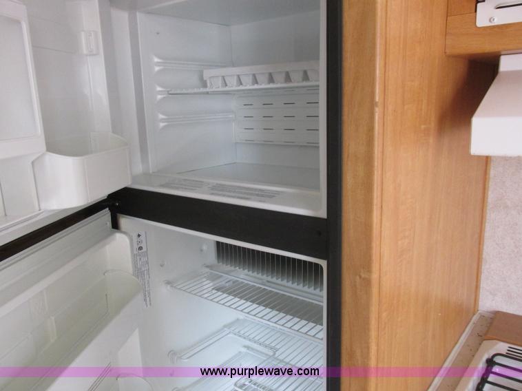 image for item L6198 2005 Sunray Smokey camper