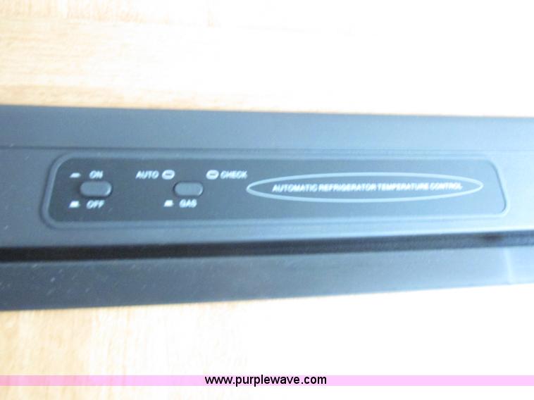 image for item L6198 2005 Sunray Smokey camper