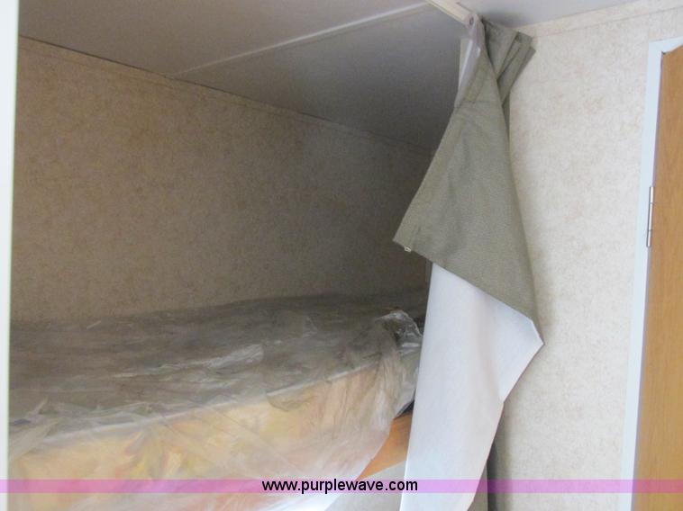 image for item L6198 2005 Sunray Smokey camper