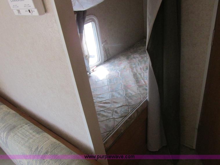 image for item L6198 2005 Sunray Smokey camper