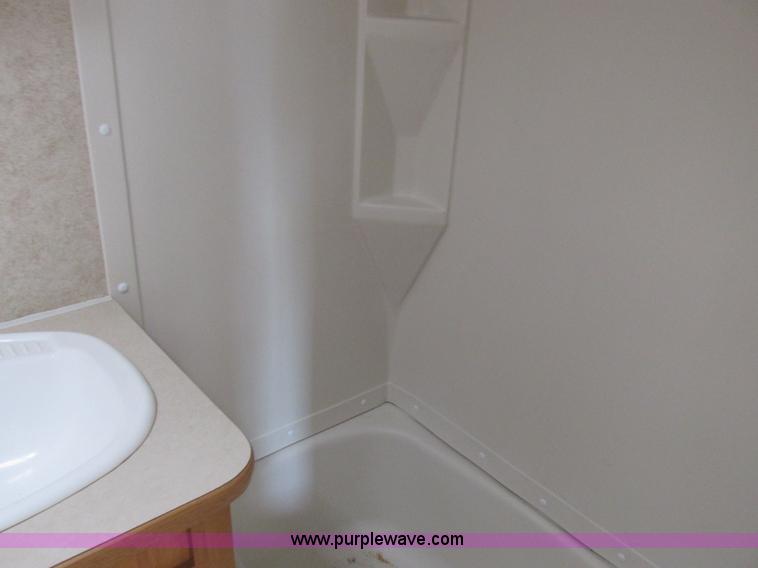 image for item L6198 2005 Sunray Smokey camper