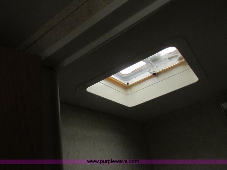 image for item L6198 2005 Sunray Smokey camper