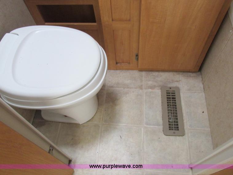 image for item L6198 2005 Sunray Smokey camper