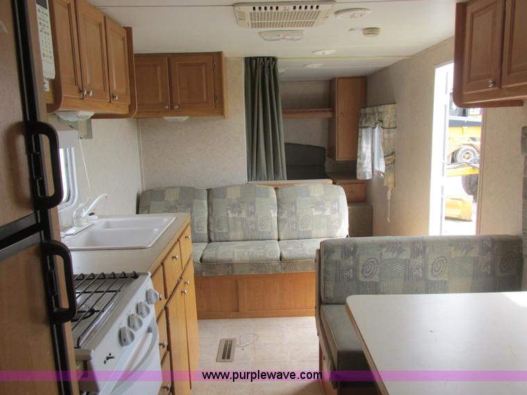 image for item L6198 2005 Sunray Smokey camper