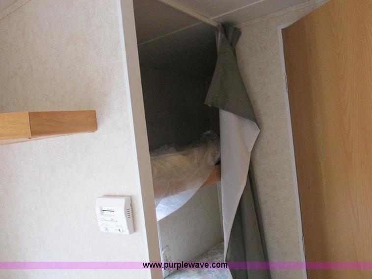 image for item L6198 2005 Sunray Smokey camper