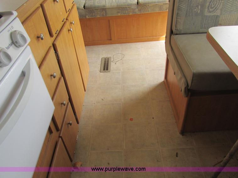 image for item L6198 2005 Sunray Smokey camper