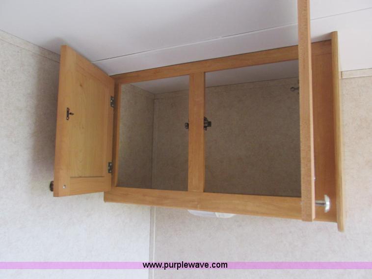 image for item L6198 2005 Sunray Smokey camper