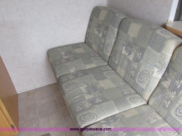 image for item L6198 2005 Sunray Smokey camper