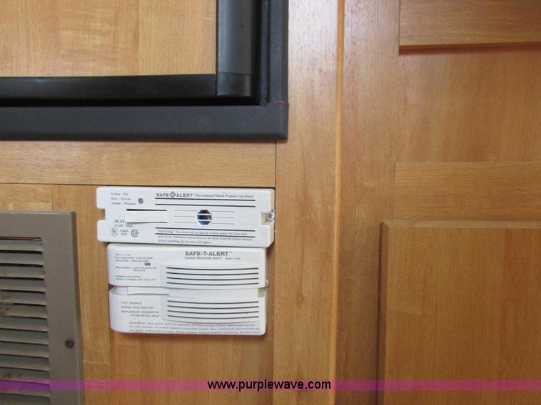 image for item L6198 2005 Sunray Smokey camper