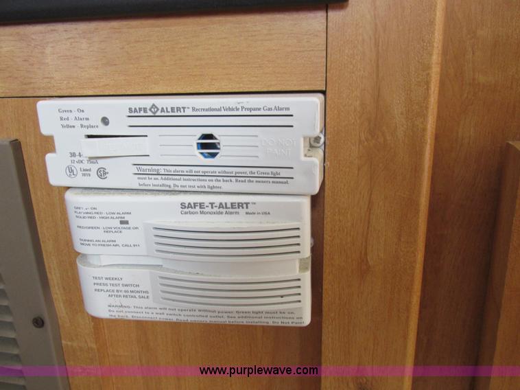 image for item L6198 2005 Sunray Smokey camper