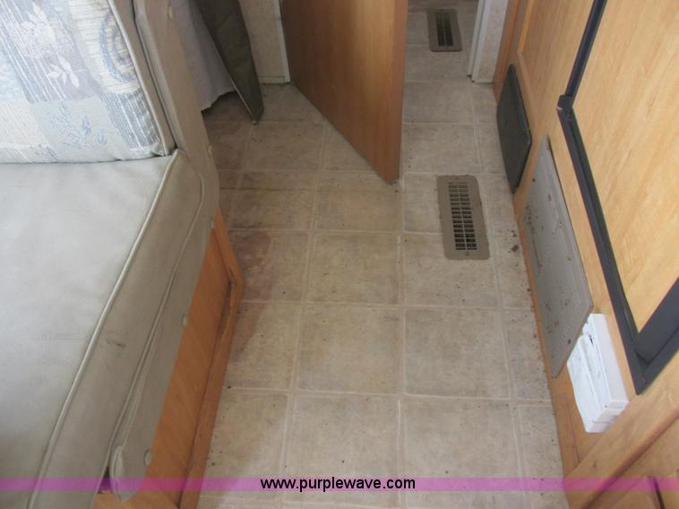 image for item L6198 2005 Sunray Smokey camper