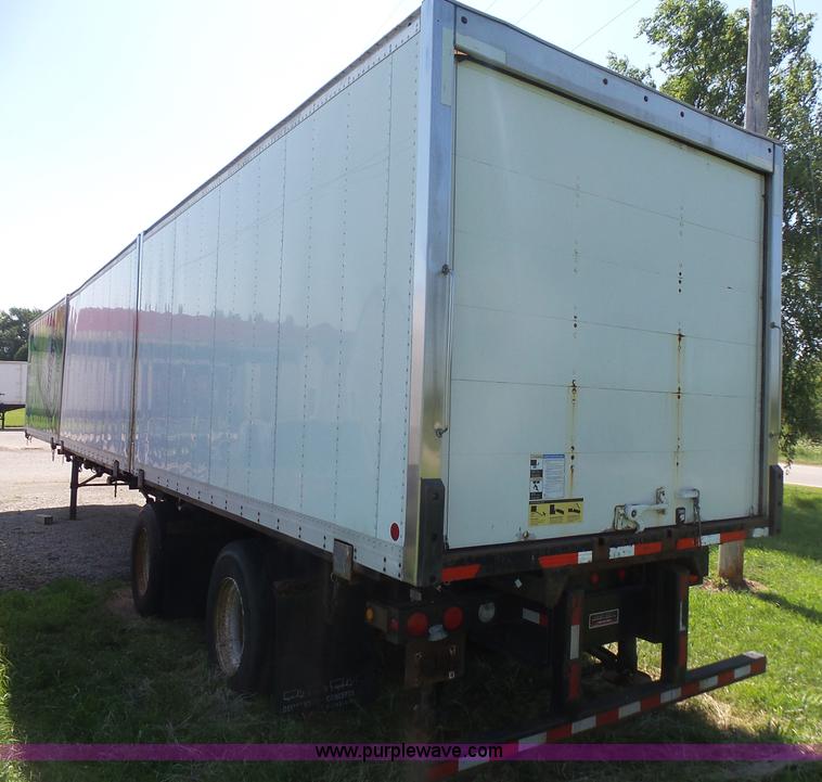 image for item K4668 2011 BWS 53VT3V Demountable Concepts trailer with storage boxes
