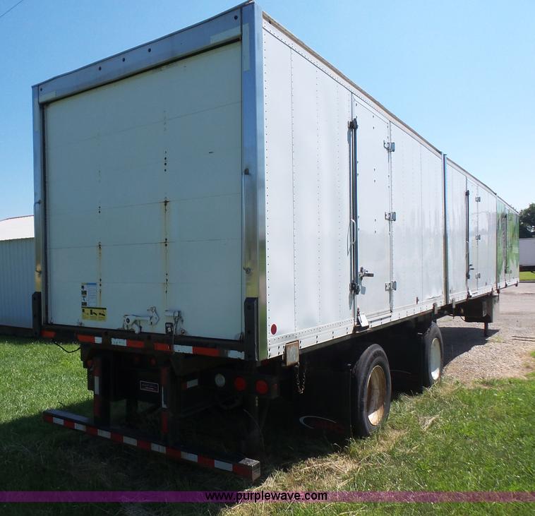 image for item K4668 2011 BWS 53VT3V Demountable Concepts trailer with storage boxes