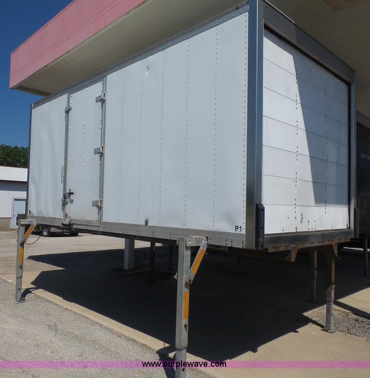 image for item K4668 2011 BWS 53VT3V Demountable Concepts trailer with storage boxes