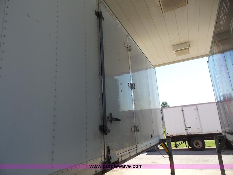 image for item K4668 2011 BWS 53VT3V Demountable Concepts trailer with storage boxes