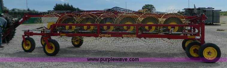 image for item J8822 2002 New Holland HT154 hay rake
