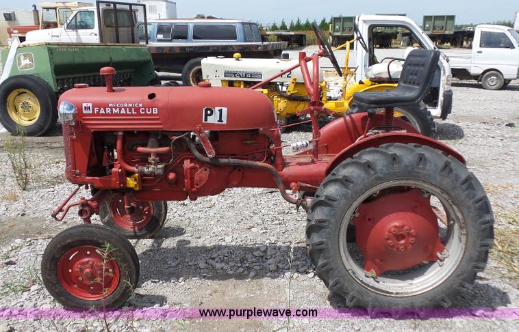 image for item K1671 Mccormick Farmall Cub tractor