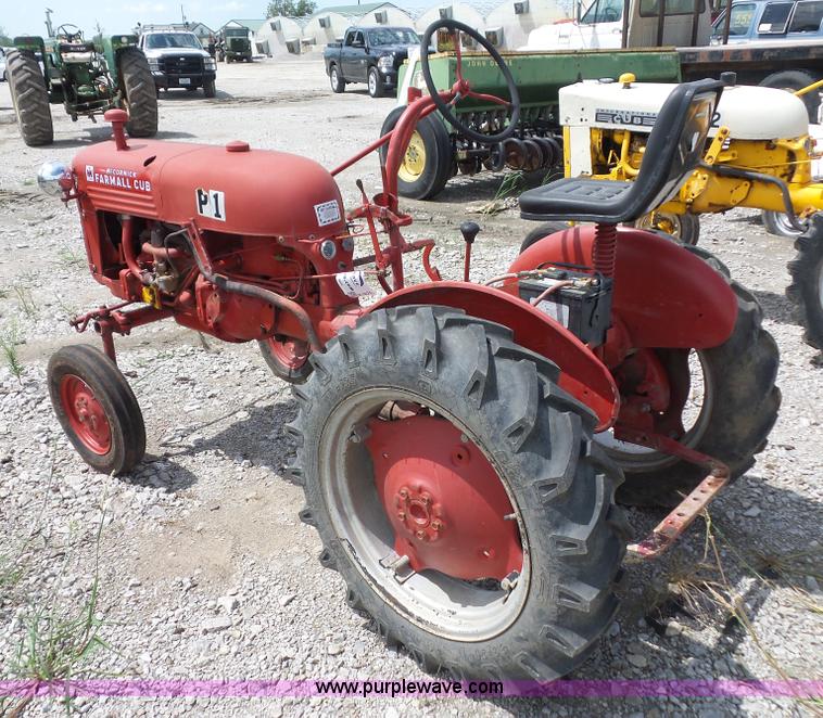 image for item K1671 Mccormick Farmall Cub tractor