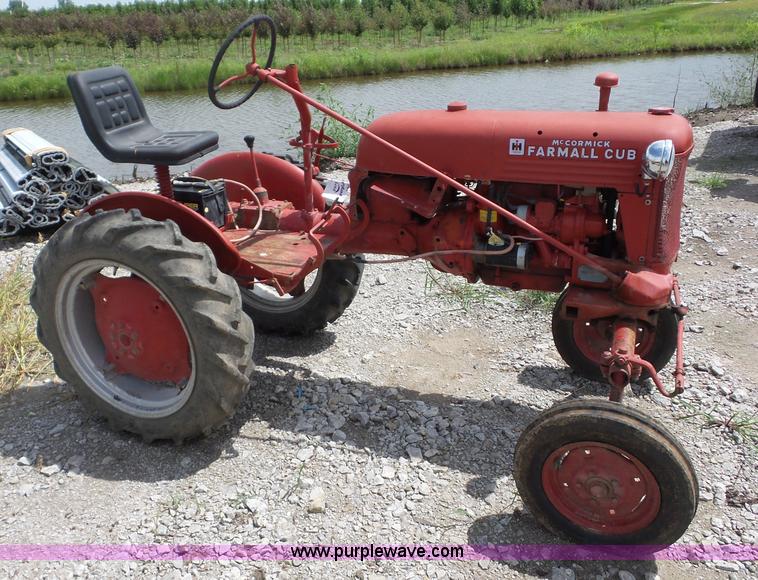 image for item K1671 Mccormick Farmall Cub tractor